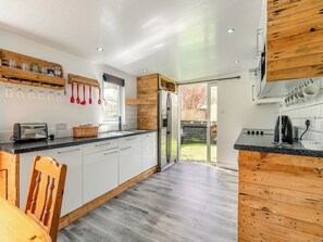Oven, dishwasher, high chair, cookware/dishes/utensils