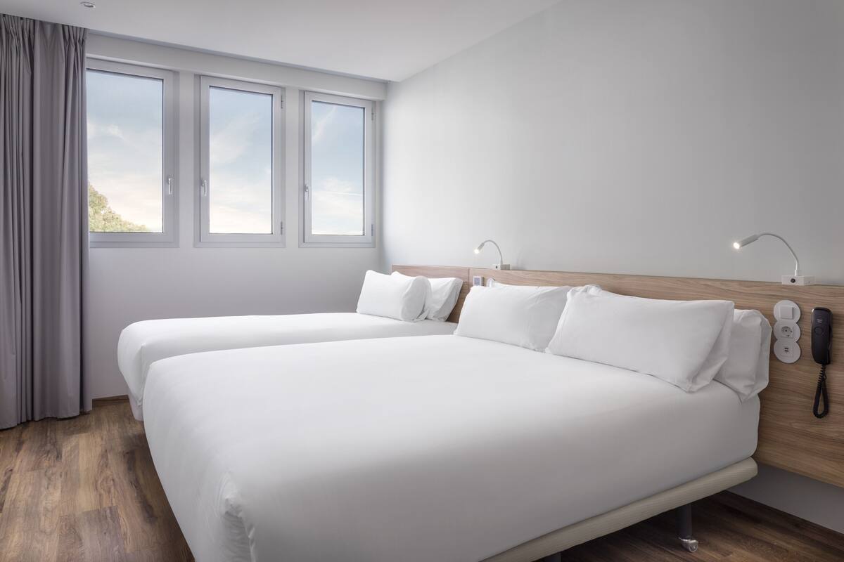 family room | 1 bedroom, minibar, in-room safe, soundproofing