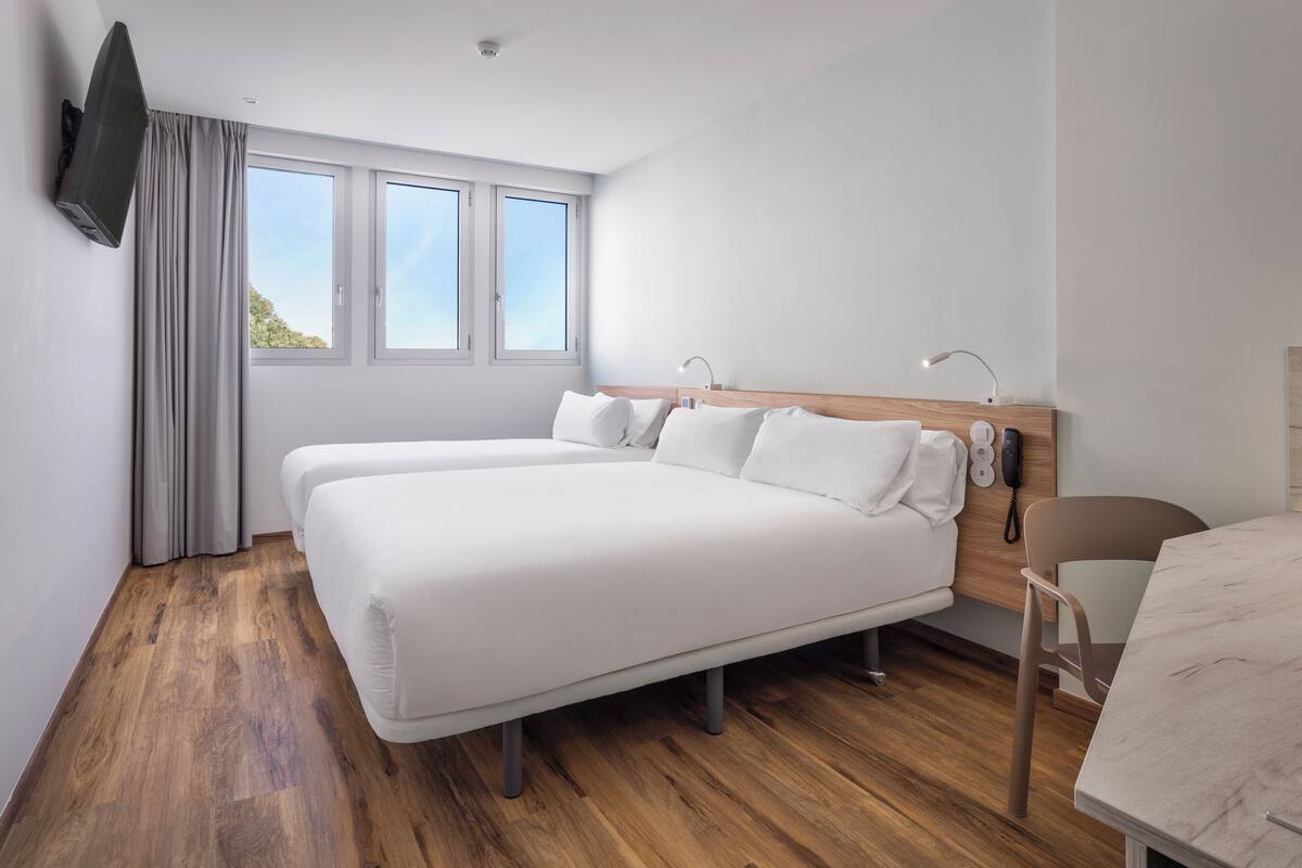 Family Room | Minibar, in-room safe, soundproofing, iron/ironing board (on request)