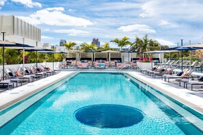 2 outdoor pools, pool umbrellas, pool loungers