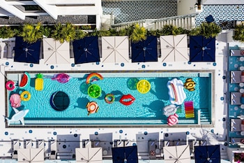 2 outdoor pools, pool umbrellas, sun loungers at Moxy Miami South Beach
