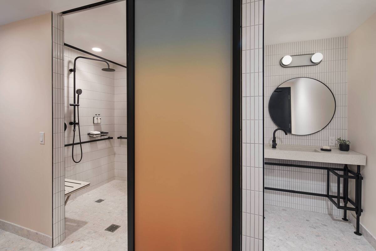 shower, rainfall showerhead, hair dryer, towels