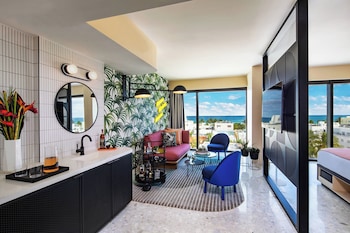 Premium bedding, pillowtop beds, in-room safe, laptop workspace at Moxy Miami South Beach