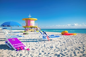 Beach nearby, white sand, sun loungers, beach umbrellas