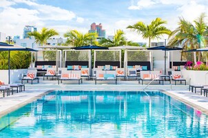 2 outdoor pools, pool umbrellas, sun loungers