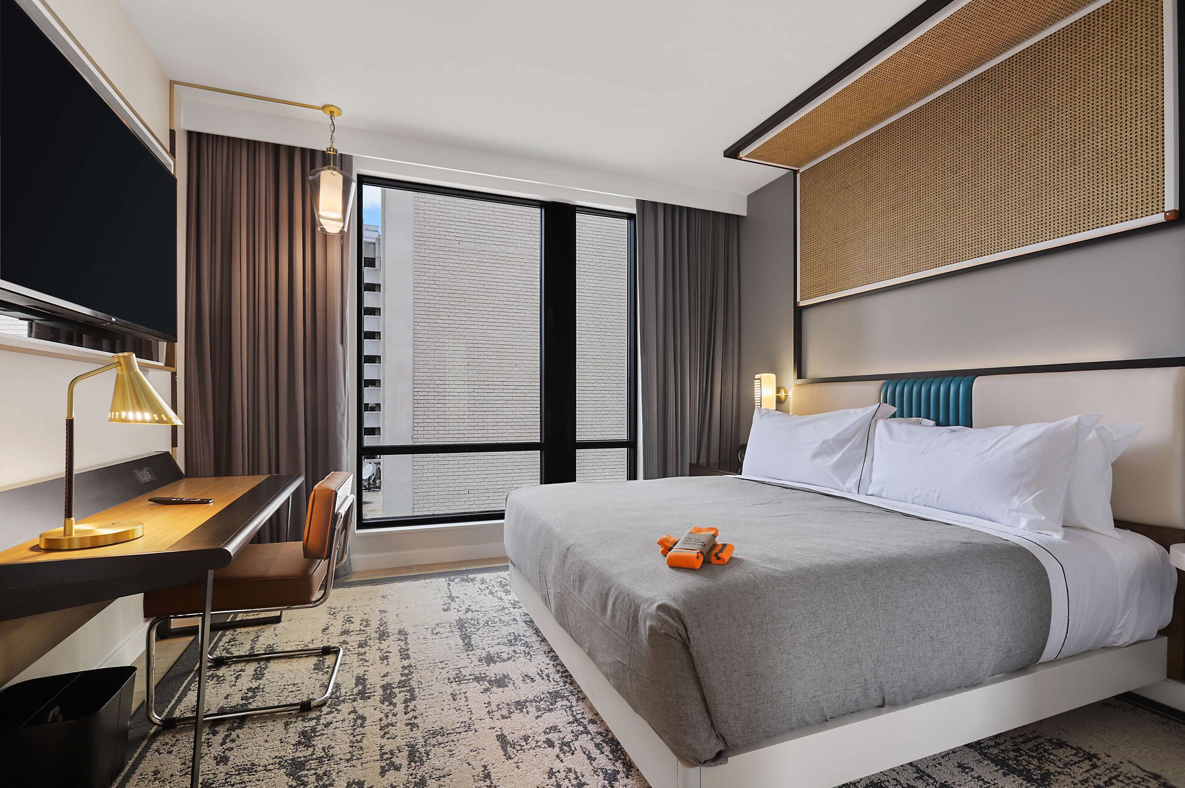 suite, 1 bedroom | in-room safe, desk, laptop workspace, iron/ironing board