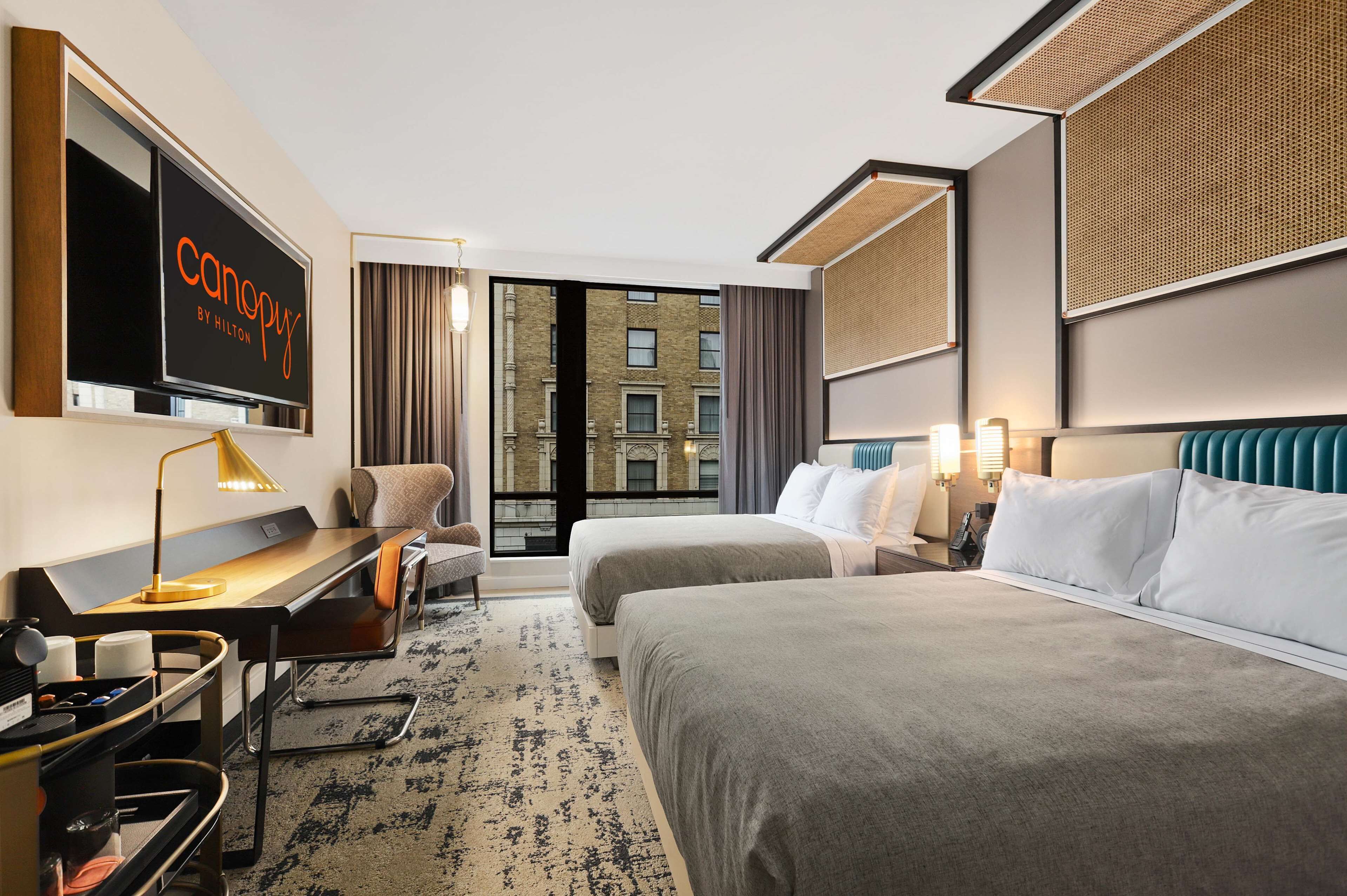 room, 2 queen beds | in-room safe, desk, laptop workspace, iron/ironing board