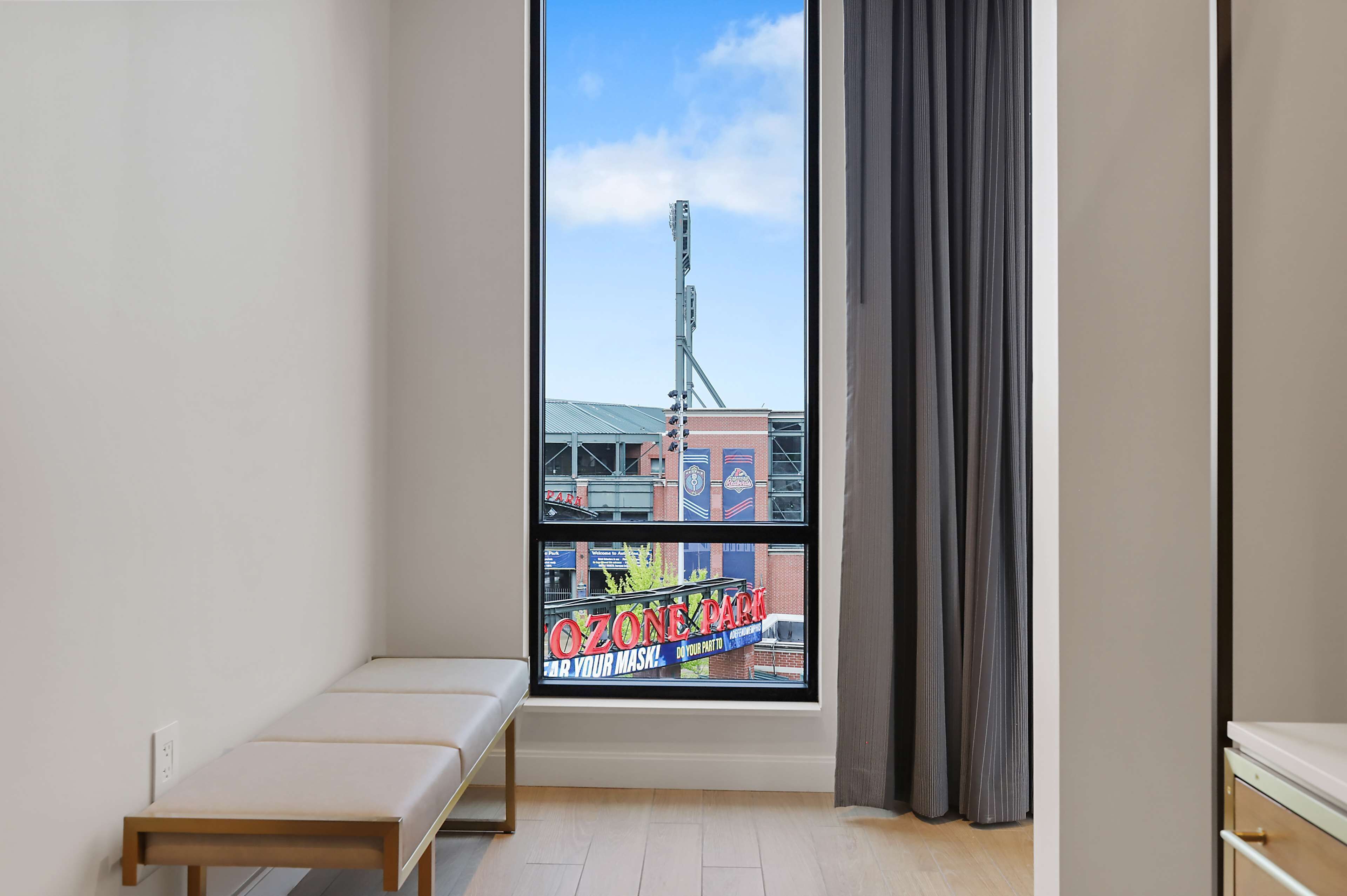 room, 1 king bed with sofa bed, corner | bathroom | hair dryer, towels, soap, shampoo