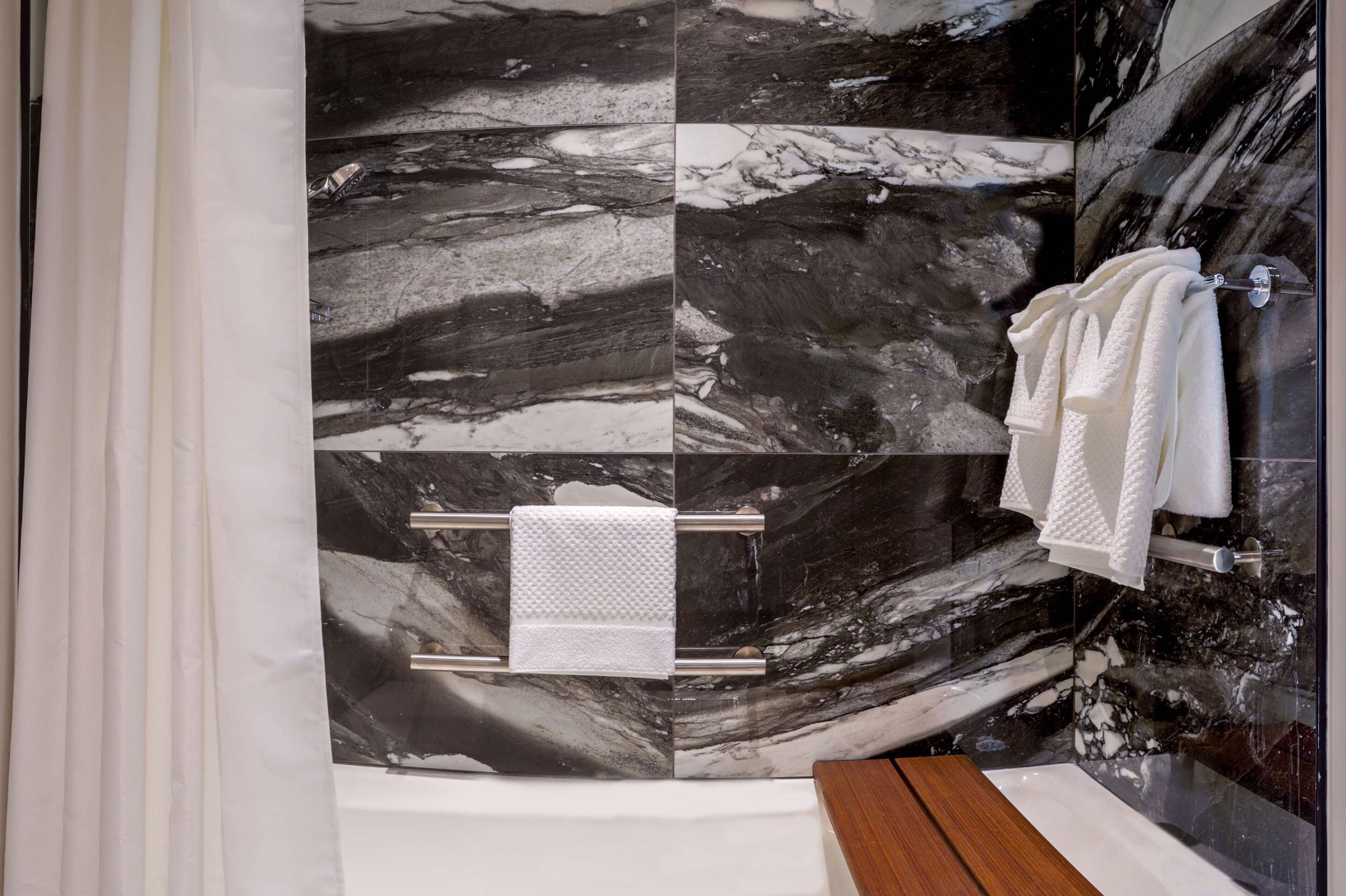 hair dryer, towels, soap, shampoo