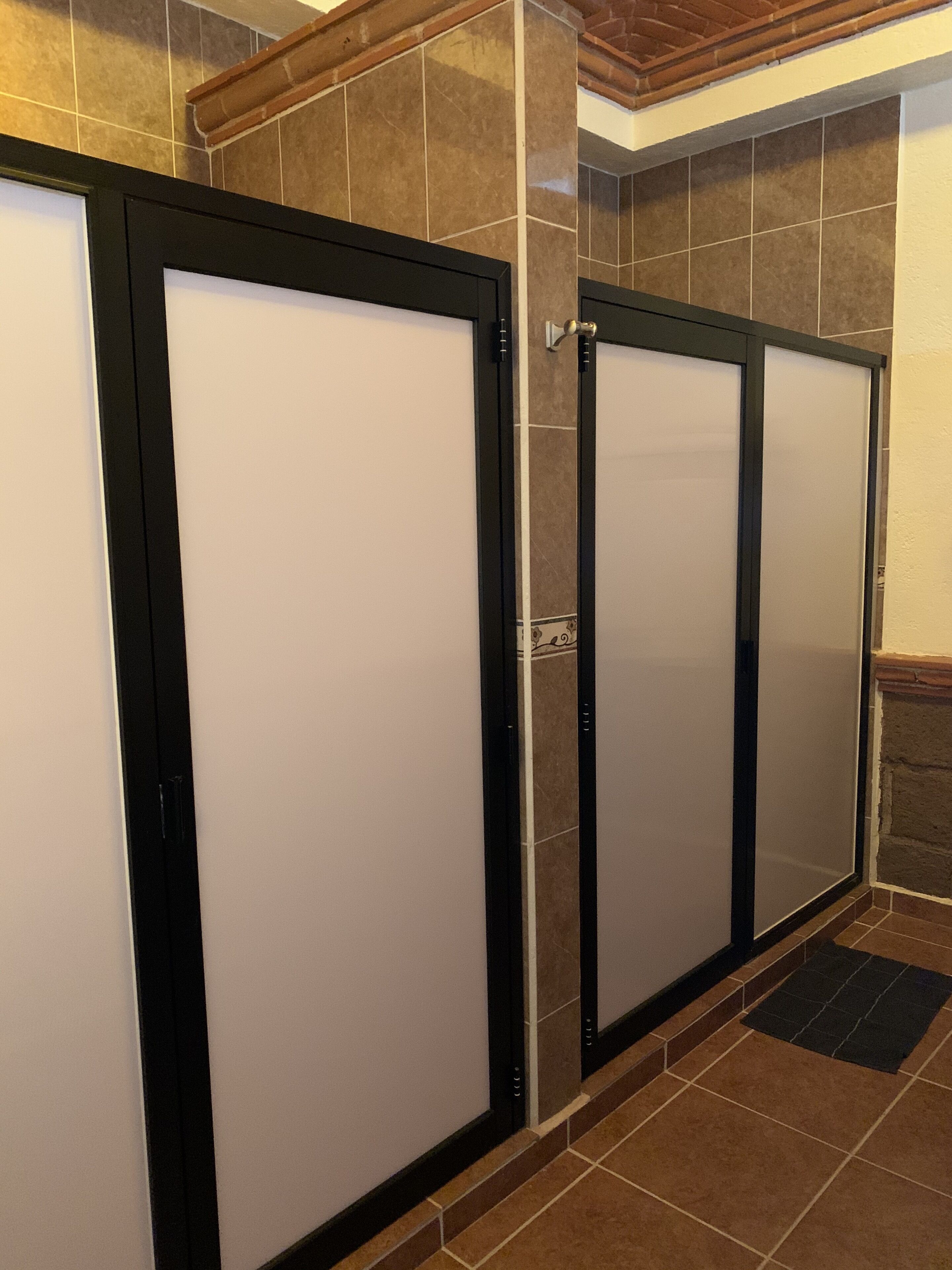 family studio suite | bathroom | shower, towels, soap, shampoo