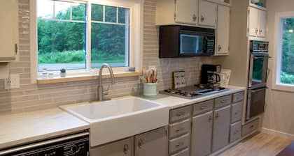 Ultimate Family Lake Retreat w/ Swim Slide, Sandy bottom, and Bar/TV Lounge