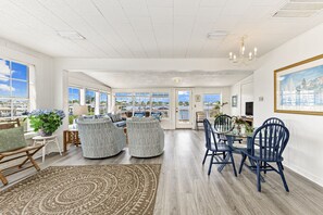 TV, books - Heron's Nest | Dock & Boat Slip | Dog Friendly | My Beach Getaways (Orange Beach)