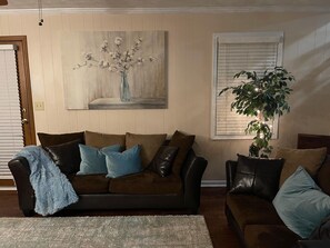 Smart TV, fireplace, table football, books