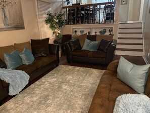 Smart TV, fireplace, table football, books