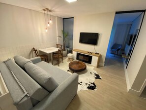 Superior Room | Living area | Flat-screen TV - Carpe Diem Boutique & Spa (Campos do Jordão)