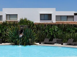 Outdoor pool, open 9:30 AM to 8:00 PM, pool umbrellas, sun loungers