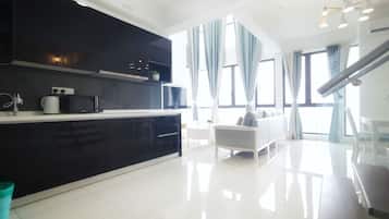 Elysia Three Bed Room Duplex | Private kitchenette | Full-sized fridge, microwave, stovetop, cookware/dishes/utensils