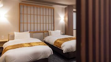 Cubrecamas, escritorio, wifi gratis y ropa de cama