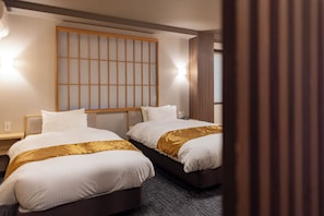 Family Twin Room (B) | 1 bedroom, down duvets, desk, free WiFi