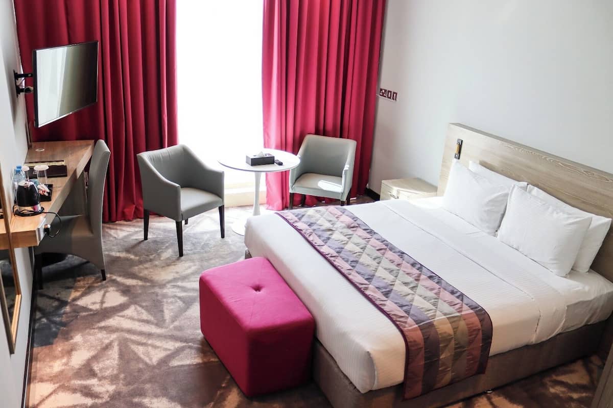 Suite ejecutiva, 1 cama de matrimonio grande | 1 dormitorio, minibar, cortinas opacas y sistema de insonorización