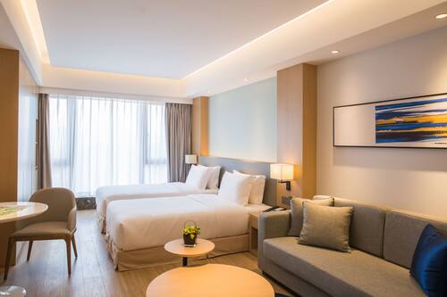 Deluxe Studio | Premium bedding, down comforters, memory foam beds, in-room safe