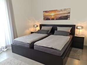 2 bedrooms, travel crib, WiFi, bed sheets