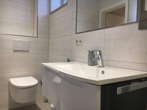 Hair dryer, towels, soap, toilet paper
