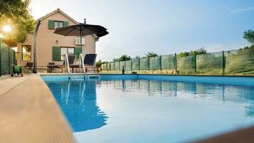 Pool | Seasonal outdoor pool, pool umbrellas, sun loungers