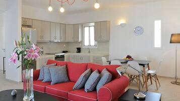 Un reproductor de DVD, una biblioteca de música, un reproductor estéreo