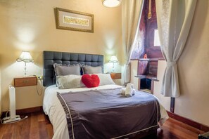 1 habitación, tabla de planchar con plancha, wifi gratis y ropa de cama 