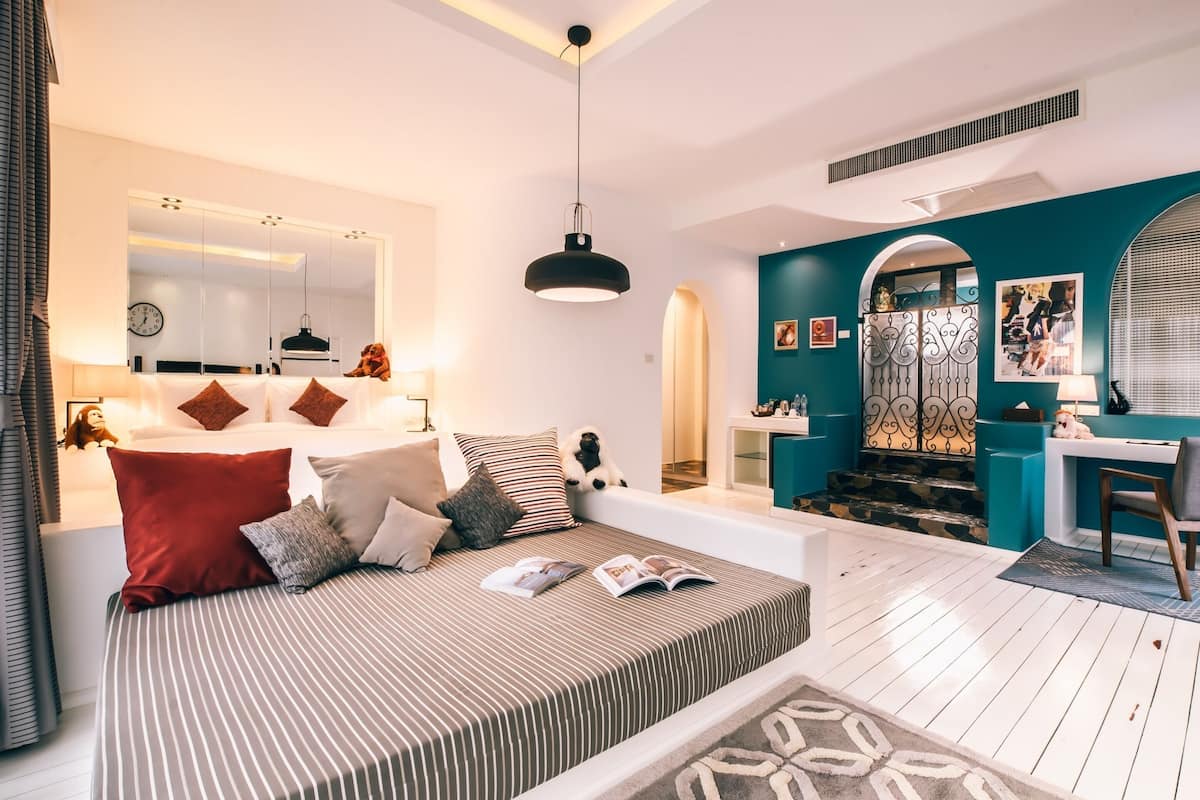 Deluxe Room With Sofa Bed (2A+1C) | Laptop workspace, WiFi (free), bed sheets