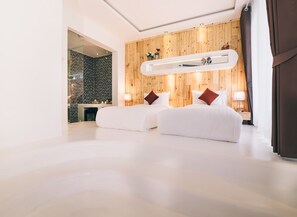 Habitación estándar con 2 camas individuales, vista al jardín | Espacio para trabajar con laptop, wifi gratis y ropa de cama 