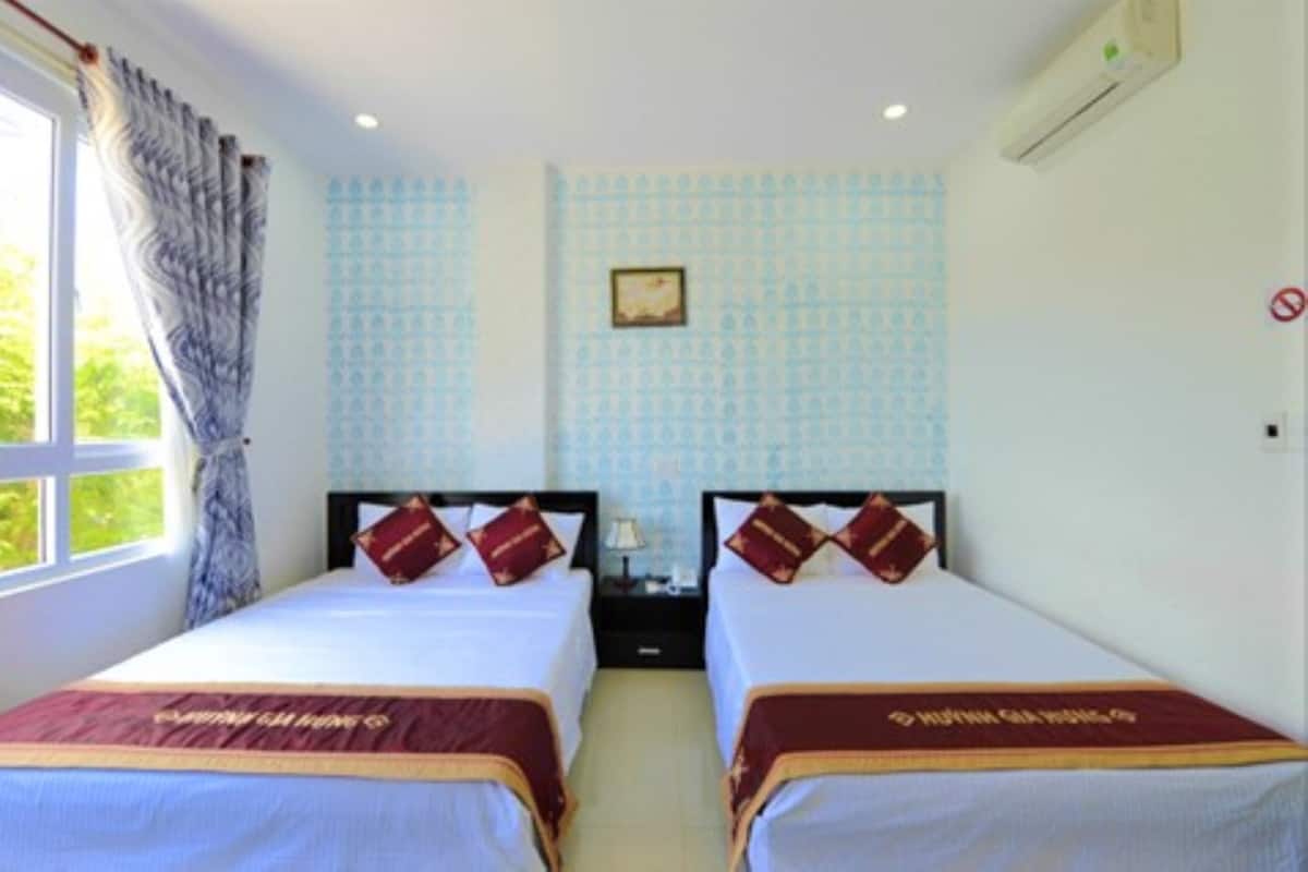 Deluxe Family Room | Desk, iron/ironing board (on request), free WiFi, bed sheets