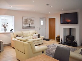 Cottage | Living room | 30-inch TV with digital channels, fireplace