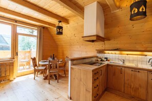 Suite prèmium | Cuina privada | Frigorífic, forn, placa de cuina i rentaplats