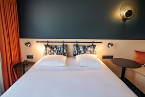 Ropa de cama de alta calidad y minibar 