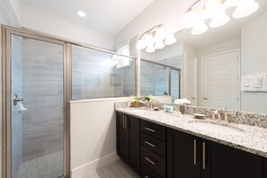 Bathtub, hair dryer, towels, soap