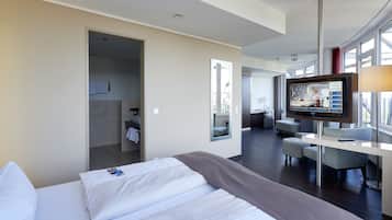 Hypo-allergenic bedding, minibar, in-room safe, desk