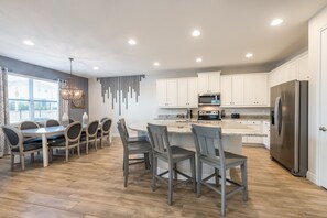 Fridge, oven, stovetop, dishwasher - Posh Home with Media and Game Room near Disney with Waterpark & Resort Access. (Reunion)