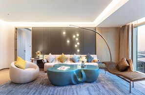 Executive Suite, 1 King Bed | Living area | 55-inch Smart TV with satellite channels, TV, pay movies - Hilton Shenzhen World Exhibition & Convention Center (Shenzhen)