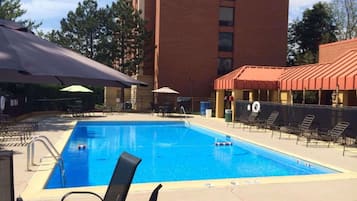 Seasonal outdoor pool, open 7:00 AM to 10:00 PM, pool umbrellas