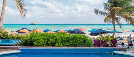 Outdoor pool, open 8:00 AM to 7:00 PM, pool umbrellas, pool loungers