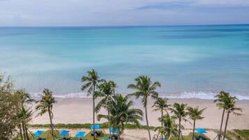 Private beach, white sand, sun-loungers, beach umbrellas