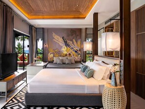 Suite Deluxe, 1 cama King size y sofá cama | Ropa de cama de alta calidad, minibar y decoración personalizada 