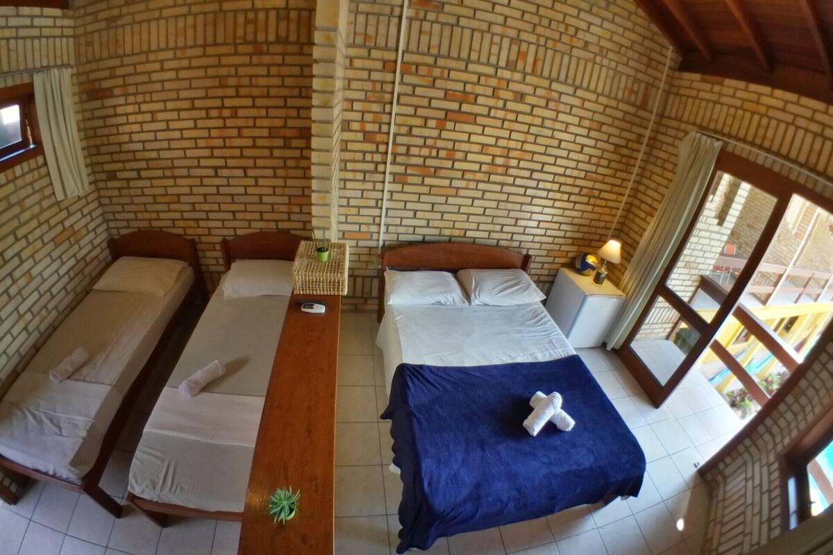 Suíte standard 2 | Minibar, blackout curtains, iron/ironing board (on request), free WiFi