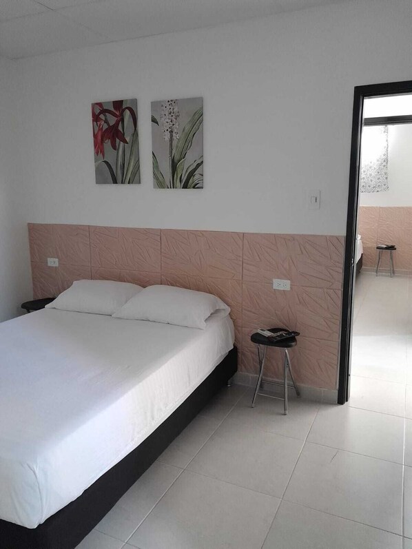 Suite ejecutiva, 2 habitaciones, cocina básica, en la zona del patio | Wifi gratis y ropa de cama