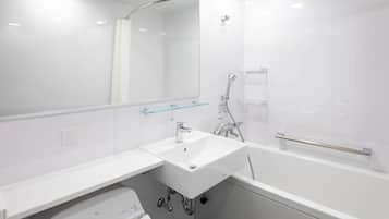 Combined shower/tub, deep soaking tub, free toiletries, hair dryer