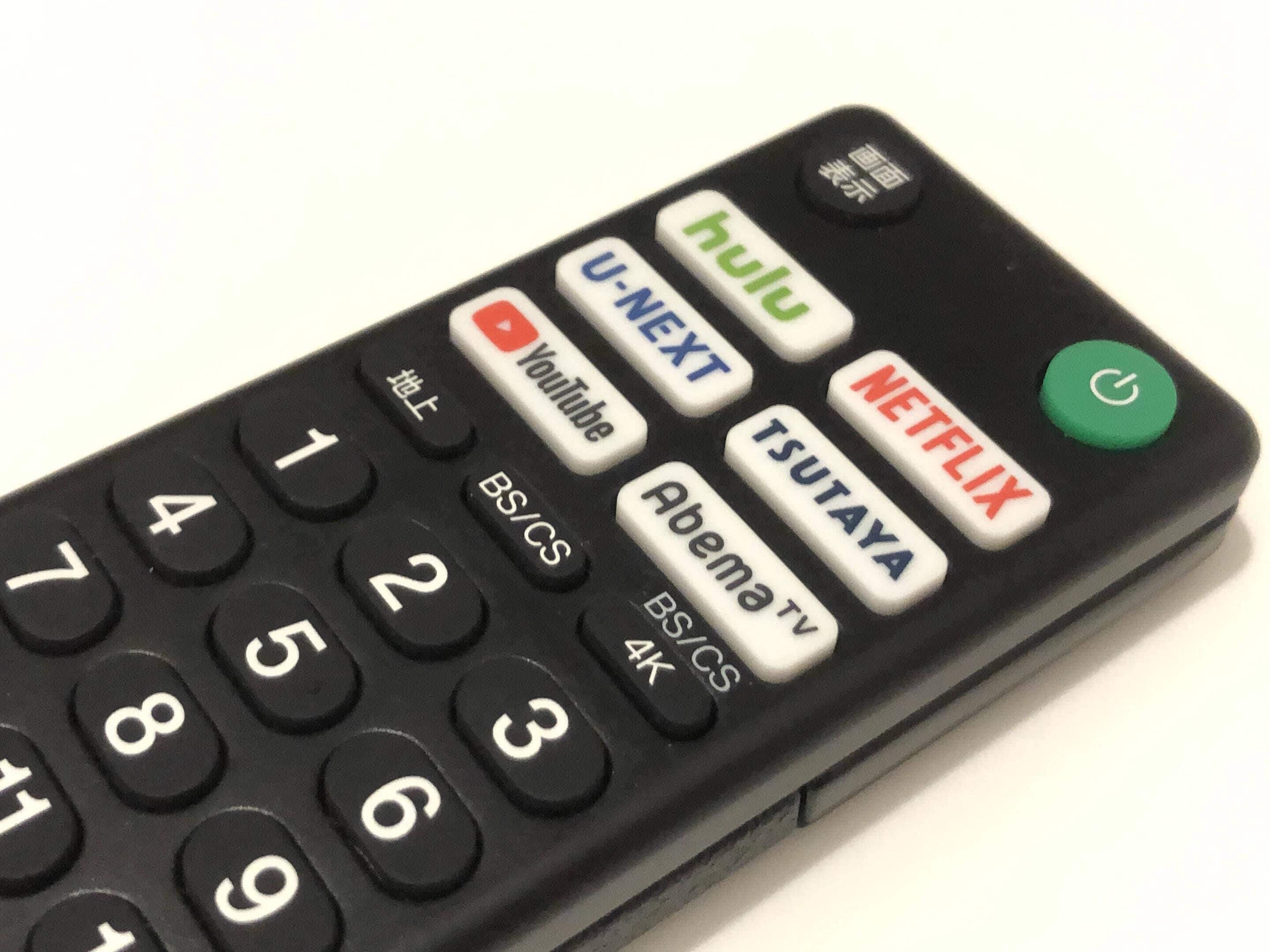 A remote control with buttons labeled for YouTube, Hulu, Netflix, and others.