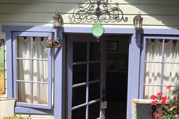 Entrance to the cottage off of your private deck.Two steps down.