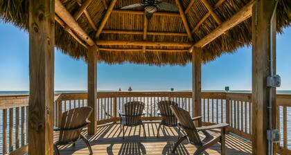 Coastal retreat with private balcony, pool, & easy beach access